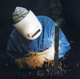 Man Performing Electric Arc Welding